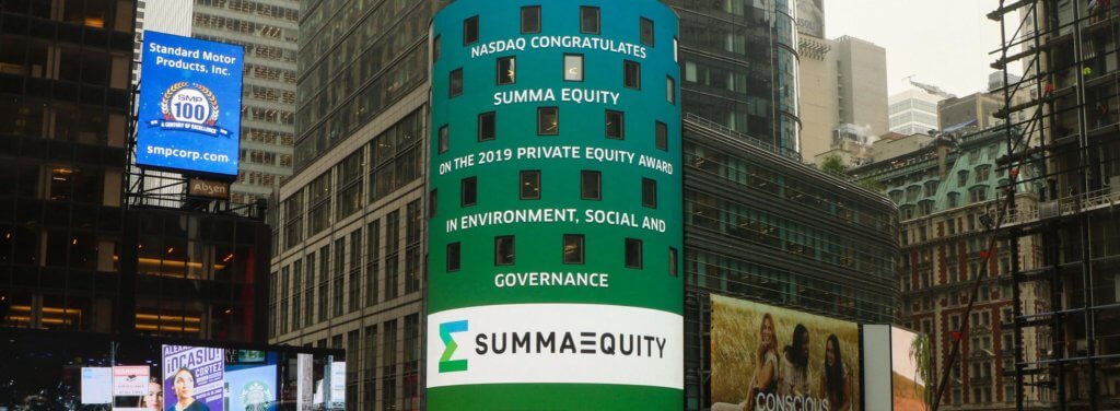 The facade of a building is projected with light, celebrating the victory of Summa Equity of the ESG awards for private equity, showing that environmental, social and governance metrics are crucial to financial performance.
